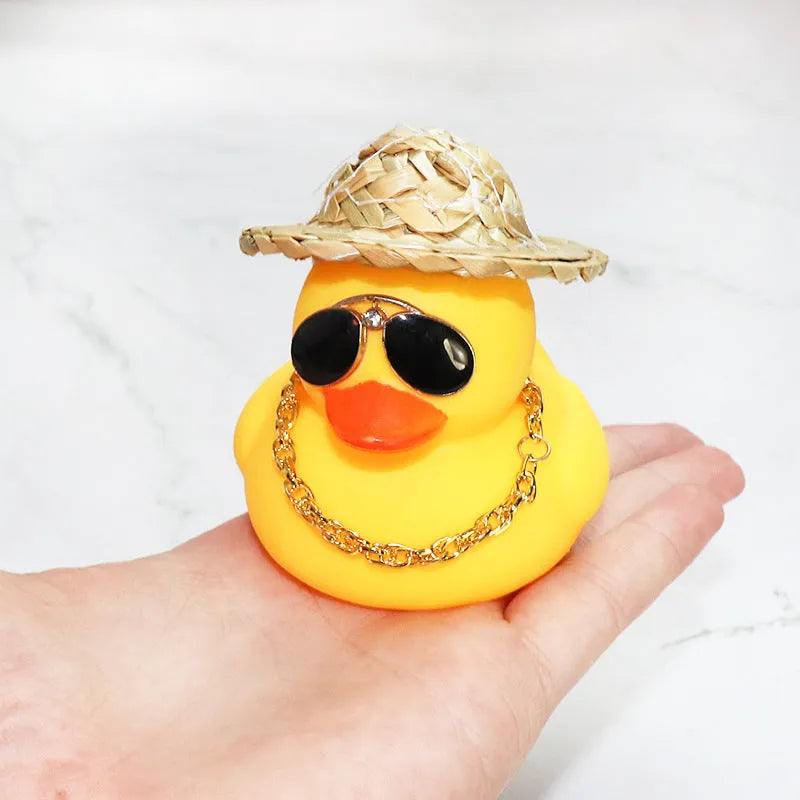Straw hat yellow duck cartoon character car ornament with plastic alloy construction and accessory necklace