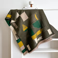 Imitation cashmere polyester scarf in beige colour, showing its 185x65cm size and texture.