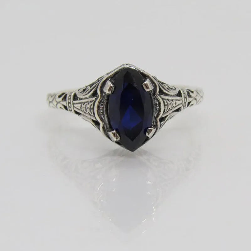 Silver women's geometric hollow ring with zircon accents on alloy band