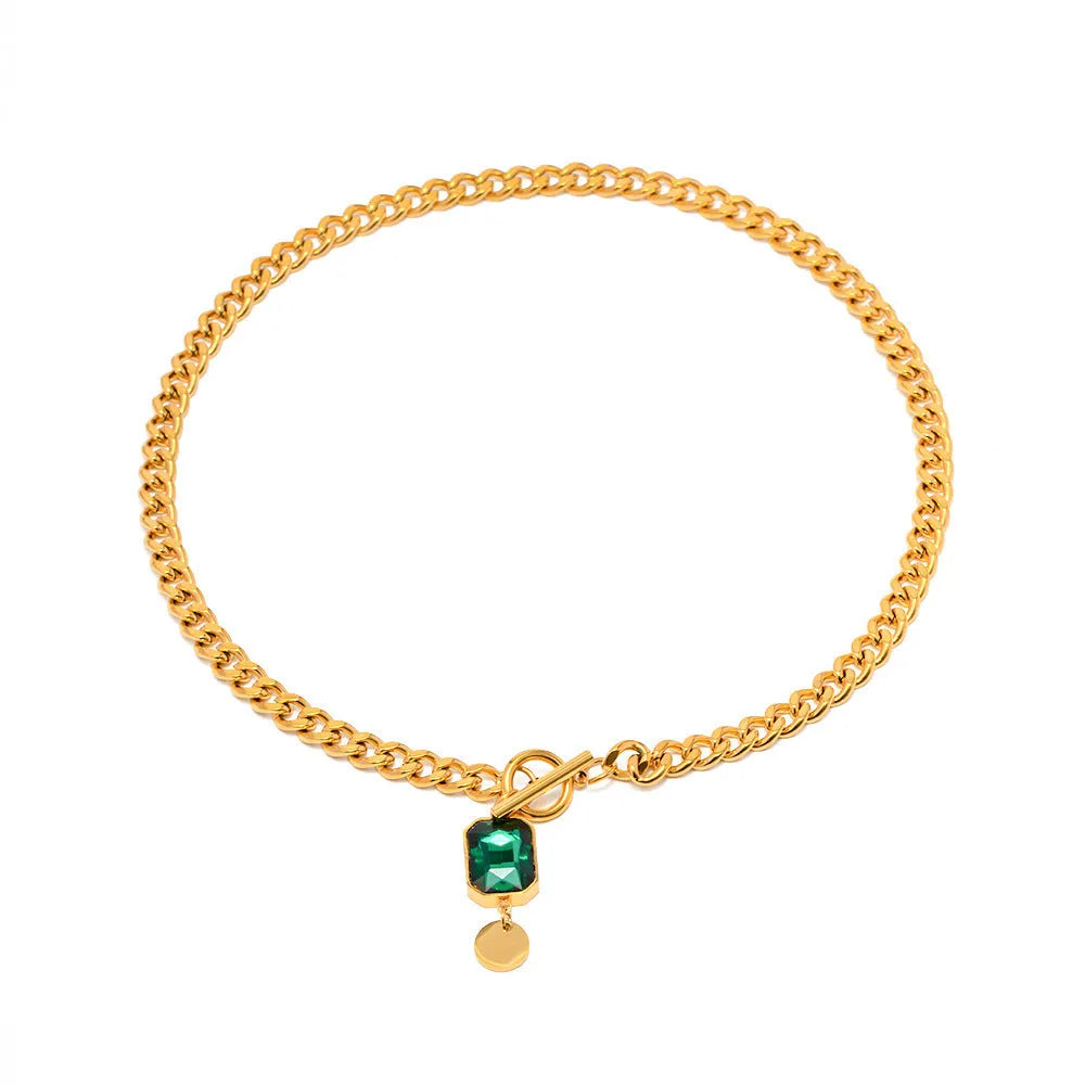 Gold electroplated titanium steel necklace with geometric round pendant and Cuban link chain
