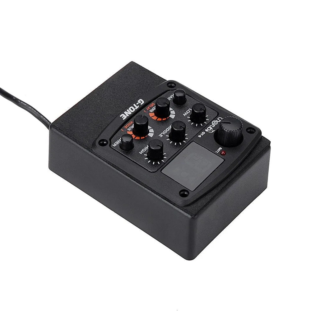 Black Cherub GT-6 acoustic guitar preamp with EQ and effects knobs for soundhole mounting.