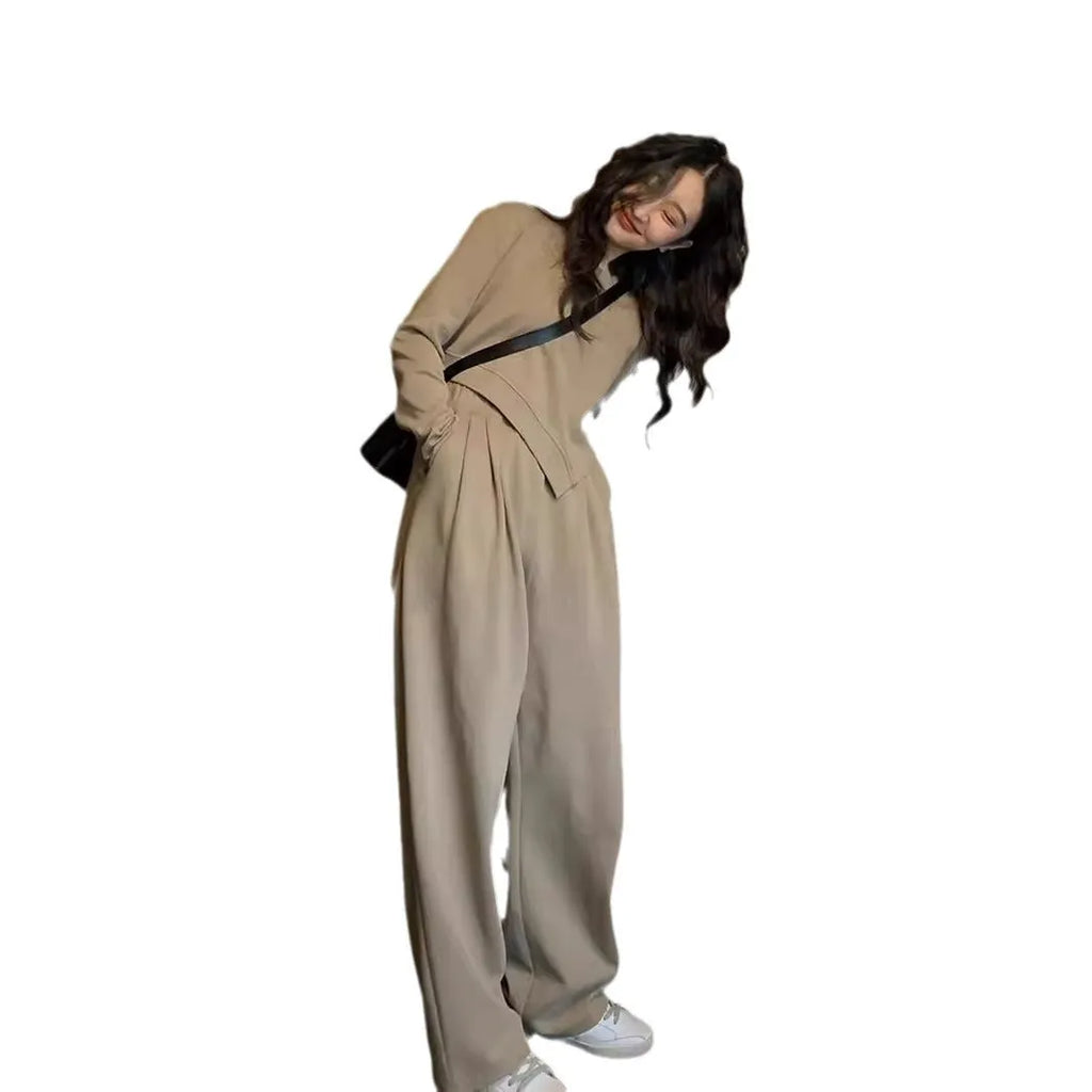 Women's khaki casual sports suit with loose-fit long sleeve top and matching trousers.
