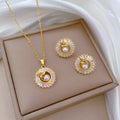 Titanium steel jewellery set with square ring, round ring, leaves necklace and stud earrings