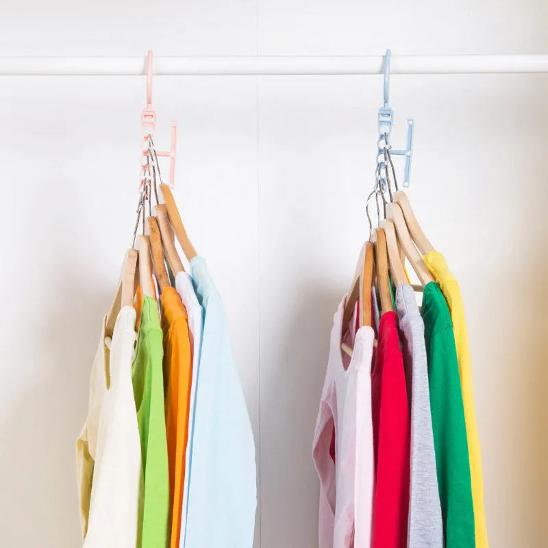 Revolving five-hole wardrobe hanger with handle in blue, green, or pink colour options