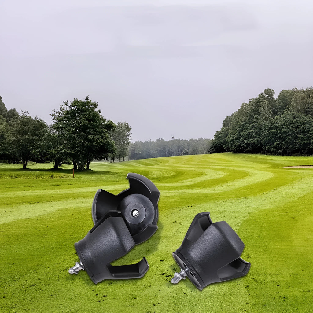 Black golf ball picker device with a clip, shown retrieving a ball on a green.