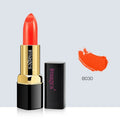 Moisturising lipstick lip gloss in a case showing colour range including coral red and pink.