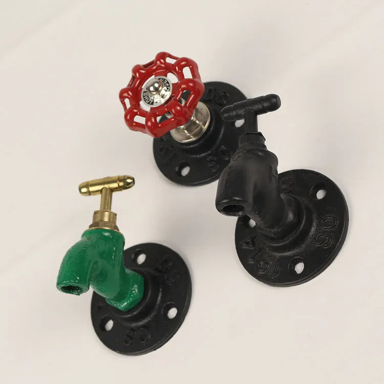 Metal wall hanging hook with water pipe design in choice of black, green, or red finish.