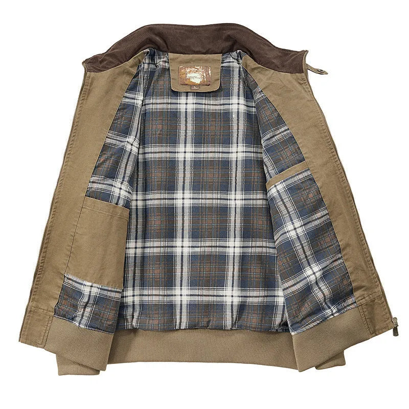 Men's washed cotton baseball-style flight jacket in beige, shown in a casual setting.