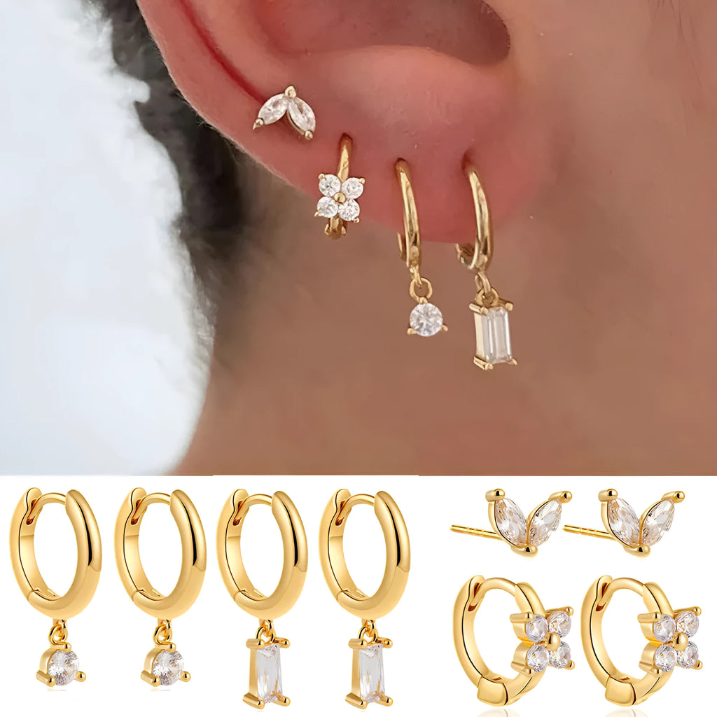 Geometric copper earrings with electroplated gold finish featuring star shapes and zircon detailing