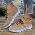 Breathable ladies flat shoes in mesh with round toe and front tie closure