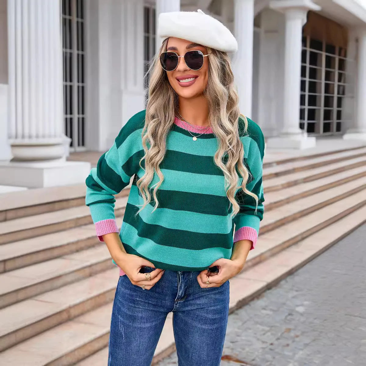 Women's loose fit acrylic sweater in blue colour with round neck and long sleeves