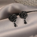 Black rose zircon stud earrings with flower shaped design on copper base
