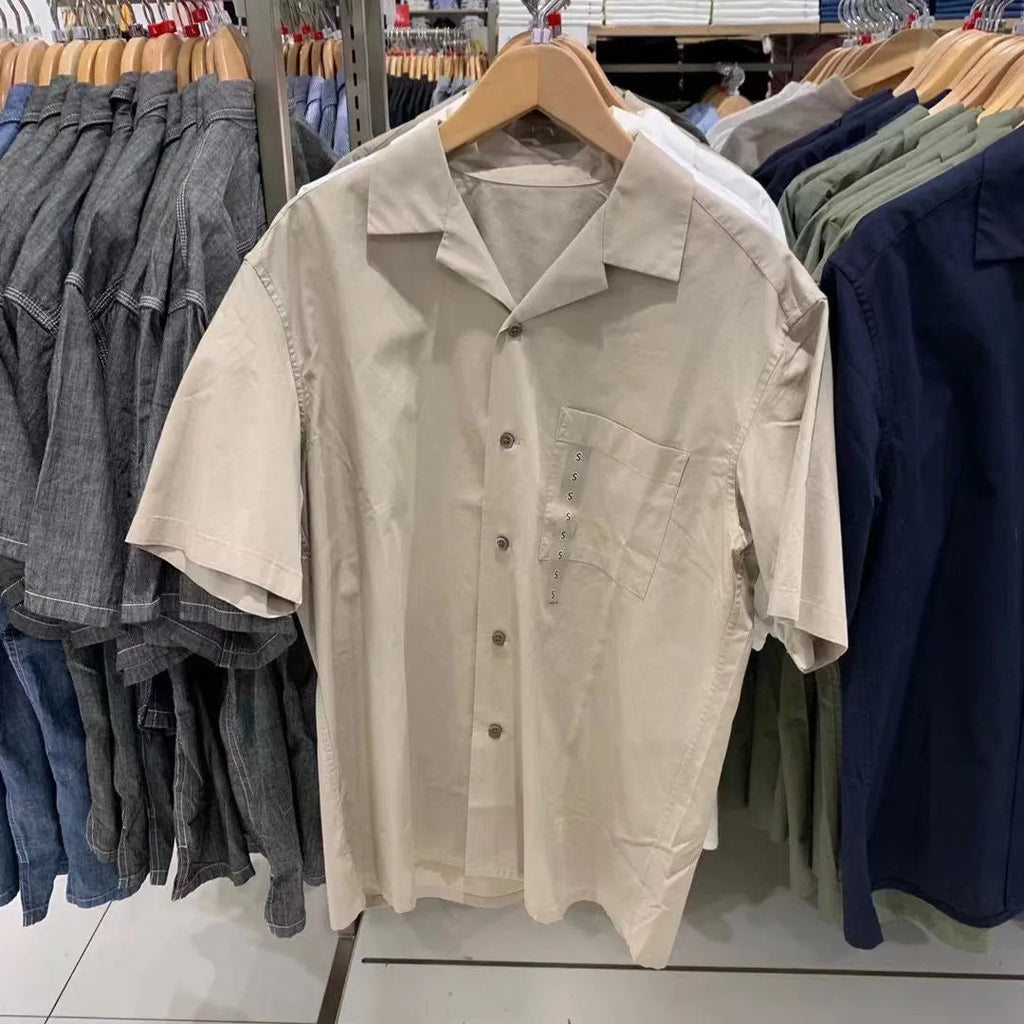 Man wearing a beige open collar modal cotton blend casual shirt in a cardigan style