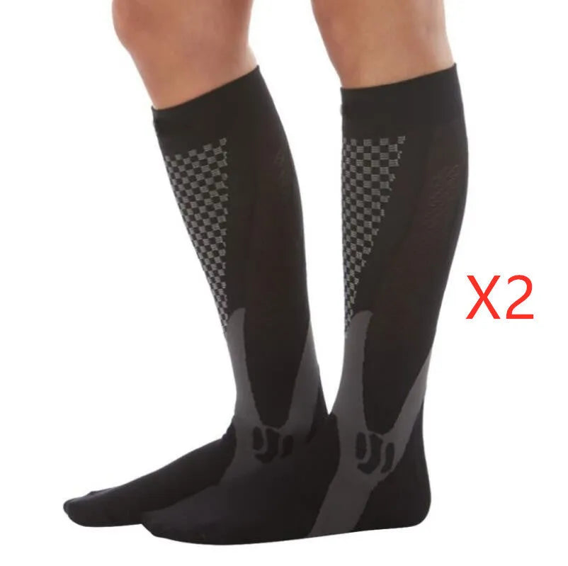 Graduated compression socks for men and women in black, blue, orange, pink, and white colour options