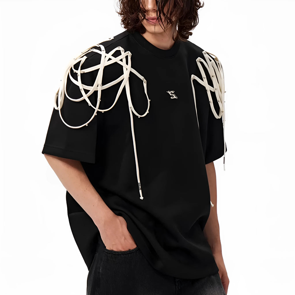 Black women's t-shirt with decorative ribbon trim padded shoulders and rivet detailing