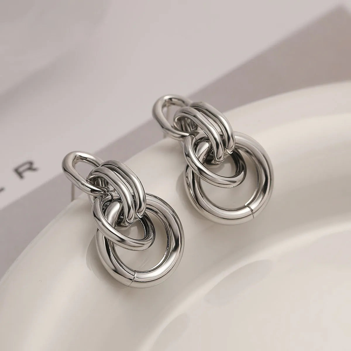Gold geometric earrings with irregular shape and high-profile design for women