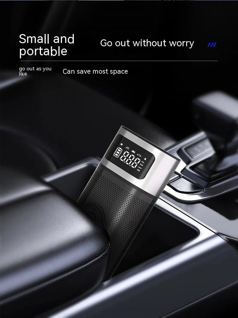 Black portable wireless vehicle air pump with digital display, LED light and flexible inflation tube