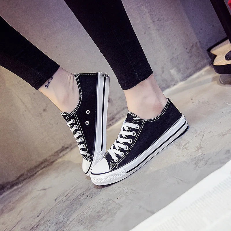 Women's solid colour canvas casual shoes shown in black, white black, white red, and all black colour options.
