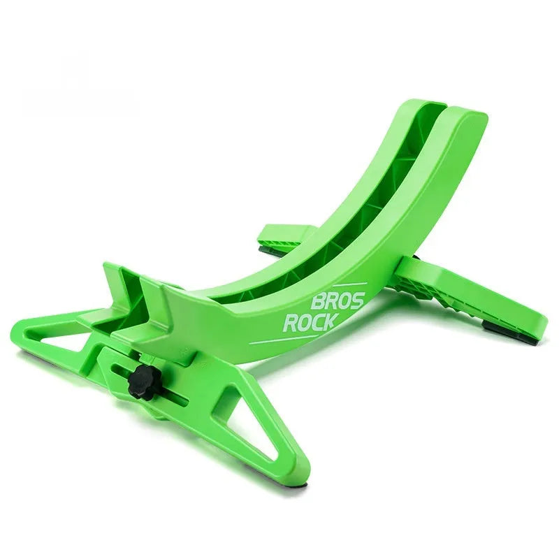 Black and green ABS plastic bicycle parking rack holder with fixed wall mounting bracket.