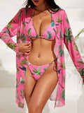 Women's floral printed mesh cover-up blouse, bra, and swim trunks three-piece swimsuit set laid flat.