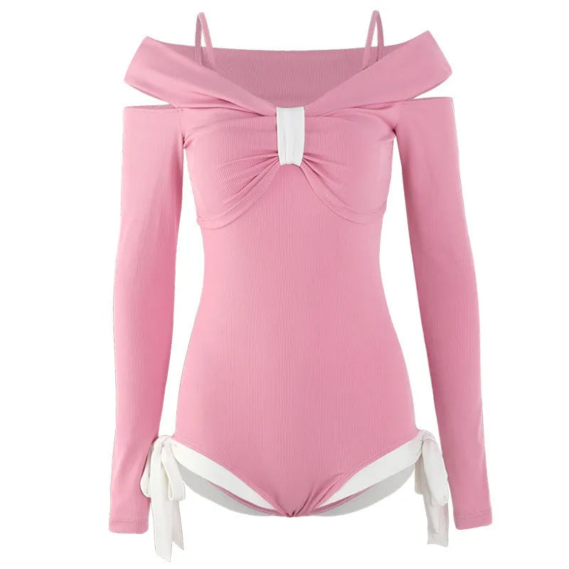 Women's long sleeve one-piece swimsuit in black or pink polyester fabric