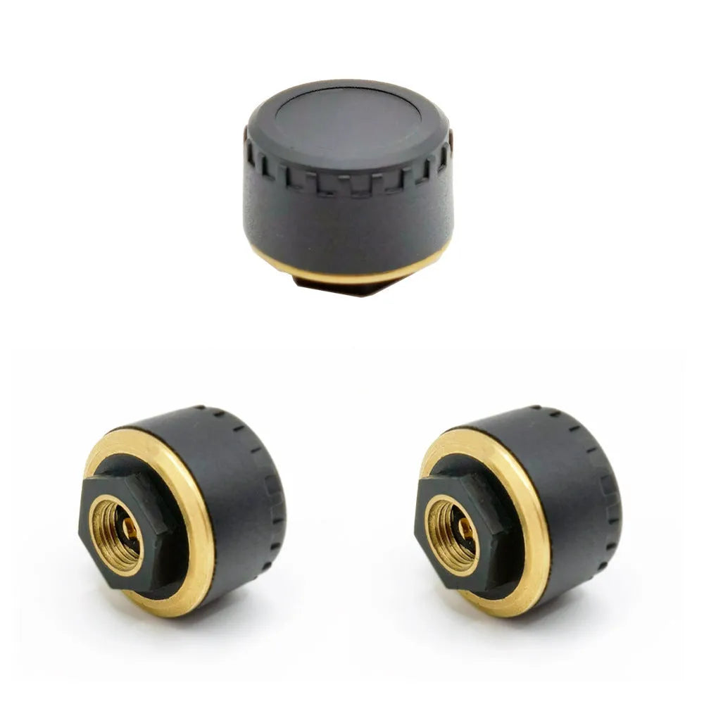Four black Bluetooth tyre pressure sensors for car with mobile phone app display