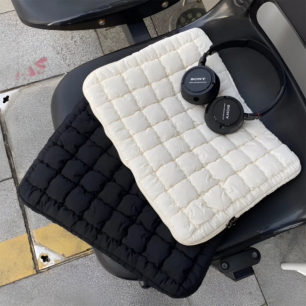 Large black and white nylon laptop bag showing cloud cotton storage compartment, suitable for 11 to 15.6 inch computers.