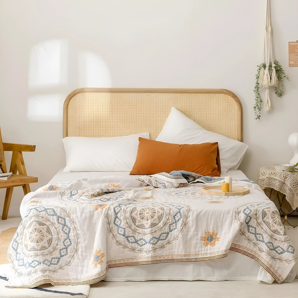 Cotton geometric patterned towel blanket laid flat, showing modern simple design