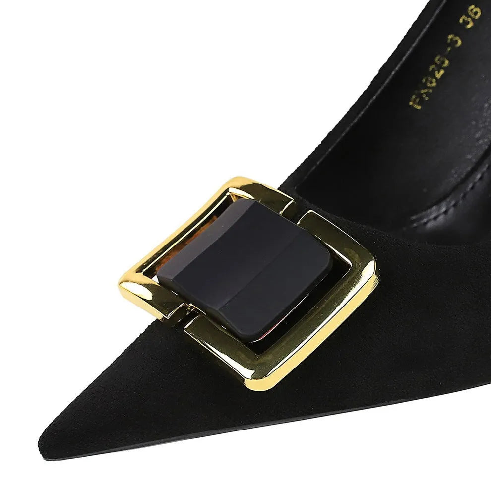 Black suede women's stiletto high heels with a pointed toe and a 9CM high heel on a rubber sole.