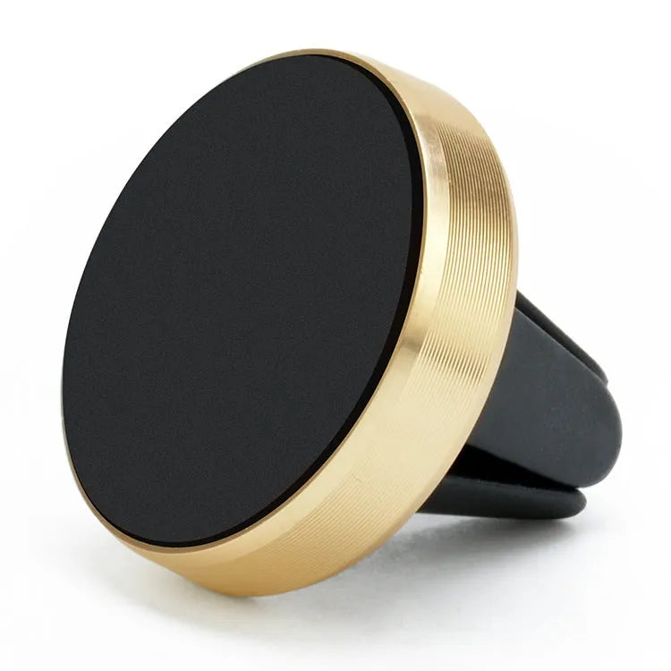 Magnetic car phone holder mounted on vehicle air vent in silver colour