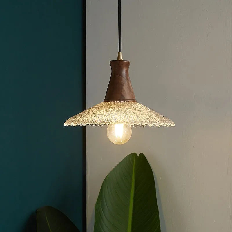 Retro style wooden and brass chandelier with glass shade ceiling lamp for restaurants.