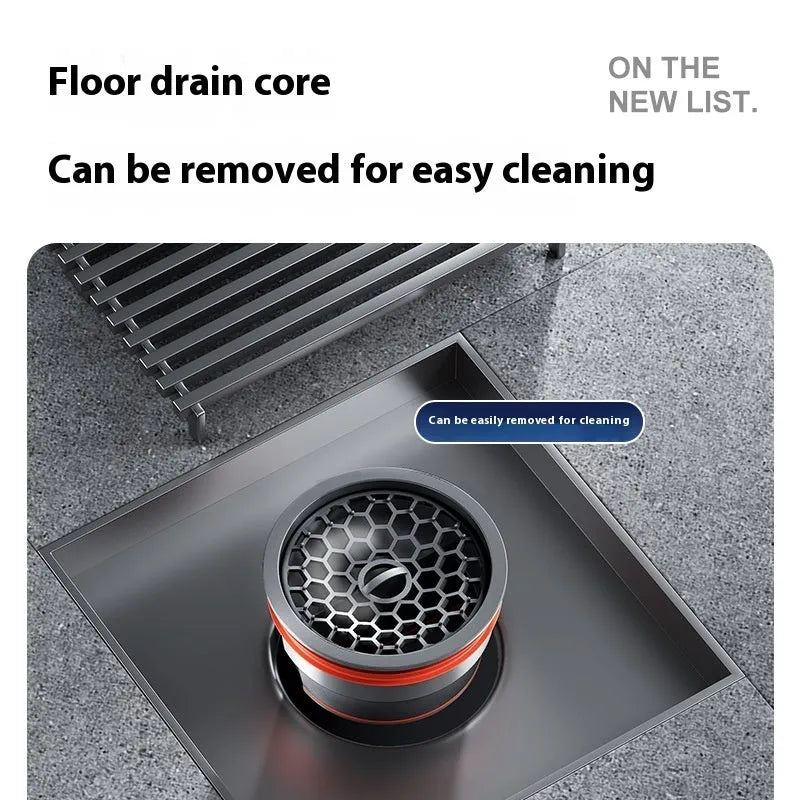 Gun grey 304 stainless steel courtyard floor drain with square grate and deodorising water seal.