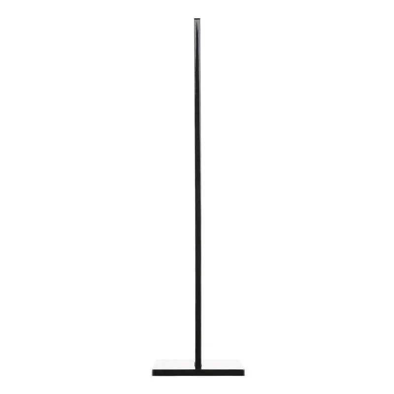 A black or pink detachable headphone stand for head-mounted gaming headsets on a desk.