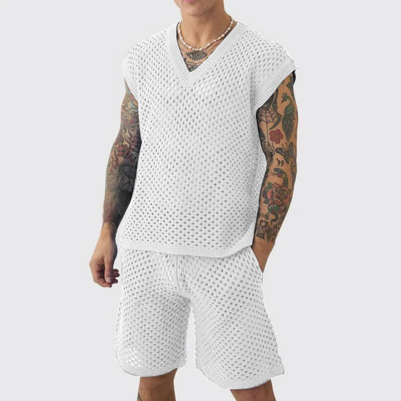 Man wearing a blue V-neck knitted vest and matching shorts from a cotton polyester sports suit set.