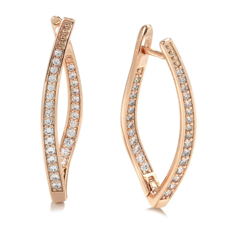 Geometric-shaped copper drop earrings for women with zircon stones, shown as a pair.