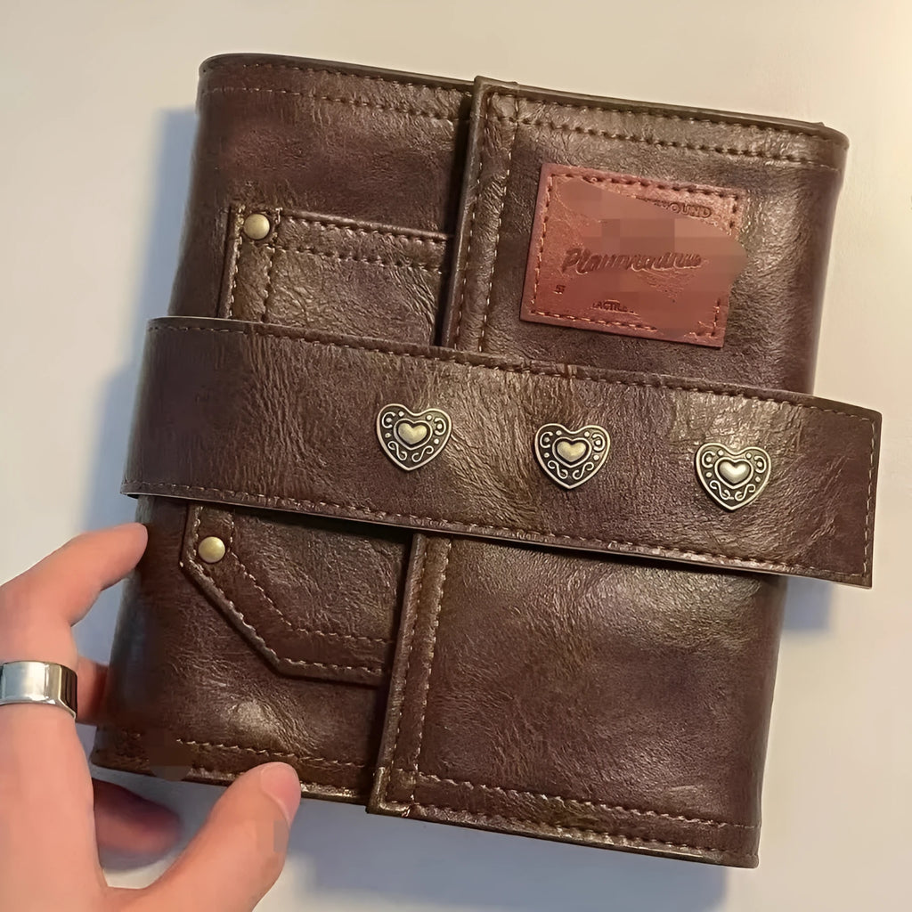 A7 brown retro leather buckle notebook with loose-leaf binding and PU cover