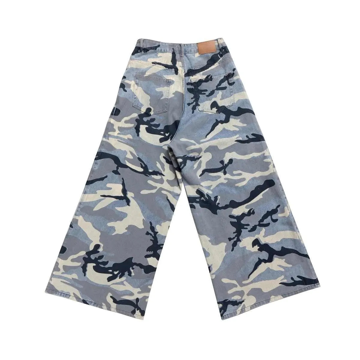 Snow camouflage blue loose-fit mid-waist jeans on a model, showing the camouflage pattern and trouser cut.