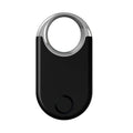Small black and white GPS anti-loss tracker device with USB charging port.