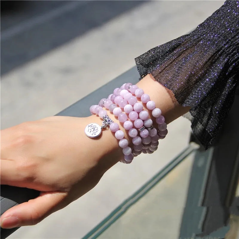 Natural stone women's bracelet with angel echeveria and lotus charm on wrist