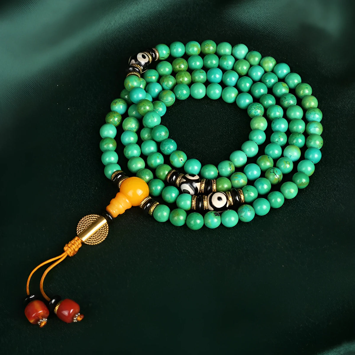 Natural turquoise bracelet with 108 round 8mm beads on wrist showing polished stone texture