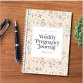 A5 Pregnancy Weekly diary notebook open to show weekly tracking pages