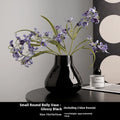 Ceramic decorative vase with glass surface in black or white colour with round belly French design