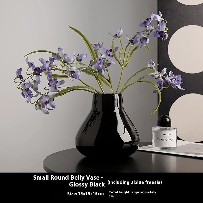 Ceramic decorative vase with glass surface in black or white colour with round belly French design