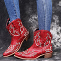 Women's cowboy boots with embroidery decoration and low wedge heel in blue colour