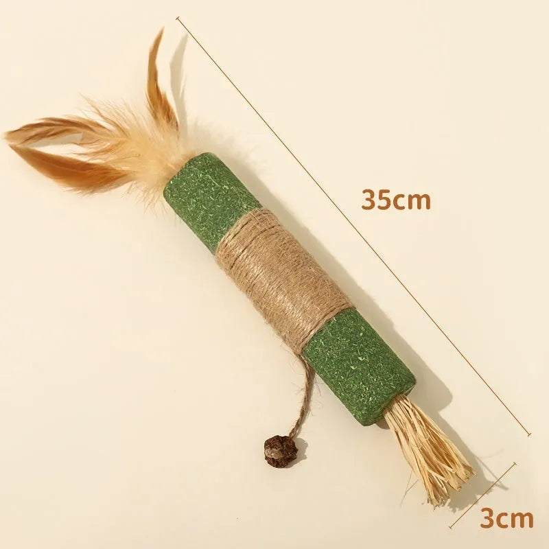 Large wooden cat chew toy with a 2.2cm diameter handle and a dangling teaser with catnip and feathers.