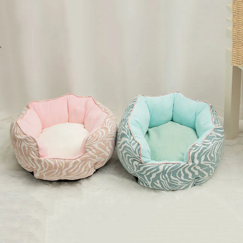 Blue octagonal pet bed with soft wool point design and removable mat for a small dog.