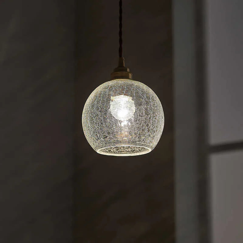 Brass electroplated copper chandelier with glass ball shade measuring 17.5cm diameter