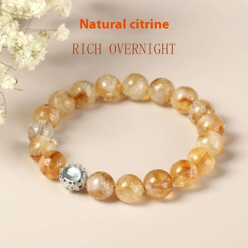 Geometric citrine crystal bracelet with 10mm polished stones on wrist
