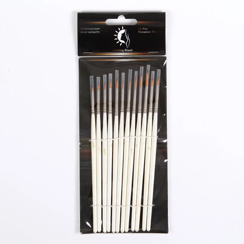 12 Pearl White artist brushes with nylon wool bristles and solid wood handles arranged by size.