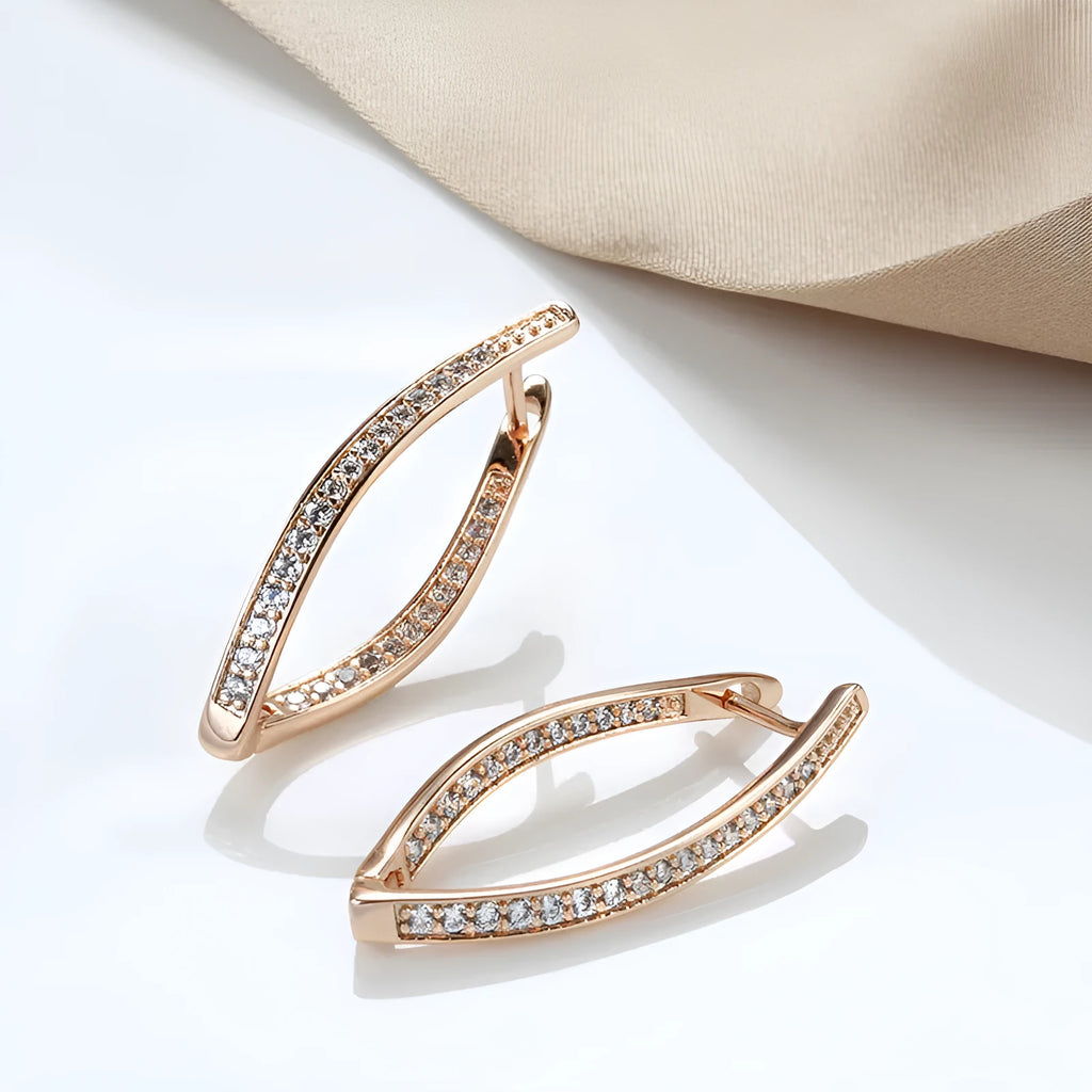 Geometric-shaped copper drop earrings for women with zircon stones, shown as a pair.